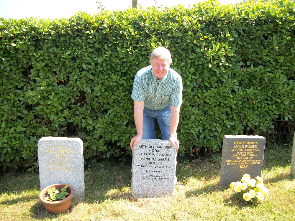 21 Adrian visiting partents grave 2010